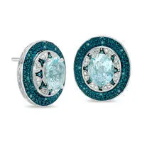 Goldia Earrings Oval Blue Topaz and 013 CT TW Enhanced Blue and White Diamond Frame Stud Earrings in Sterling Silver Goldia Earrings Oval Blue Topaz and 013 CT TW Enhanced Blue and White Diamond Frame Stud Earrings in Sterling Silver